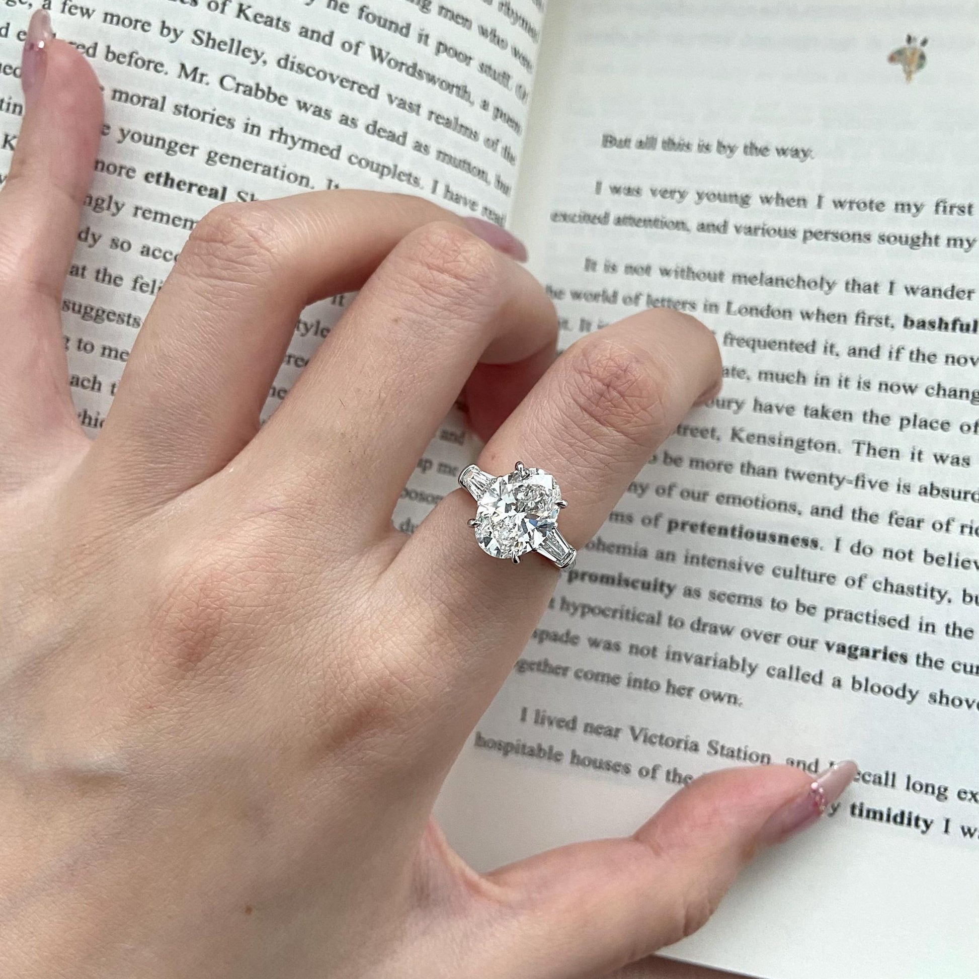 Oval cut CVD diamond three stone engagement ring