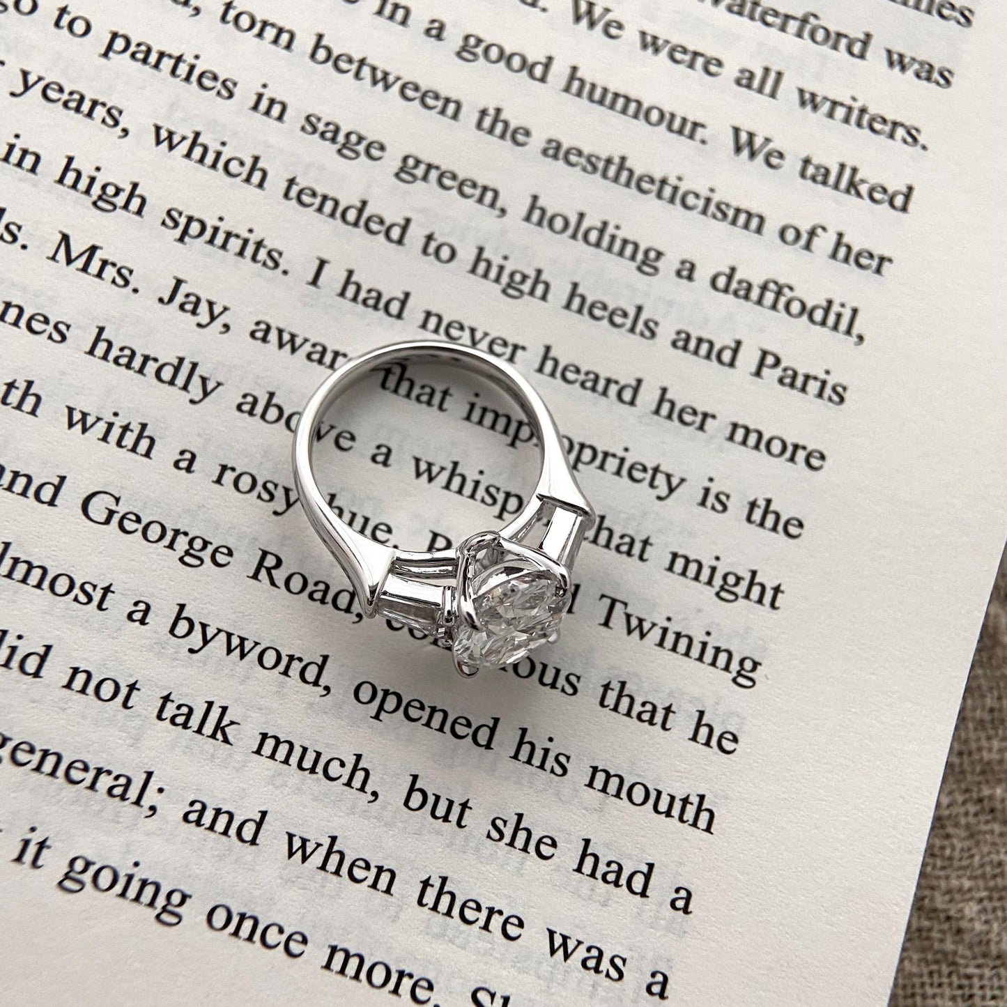 Oval cut CVD diamond three stone engagement ring