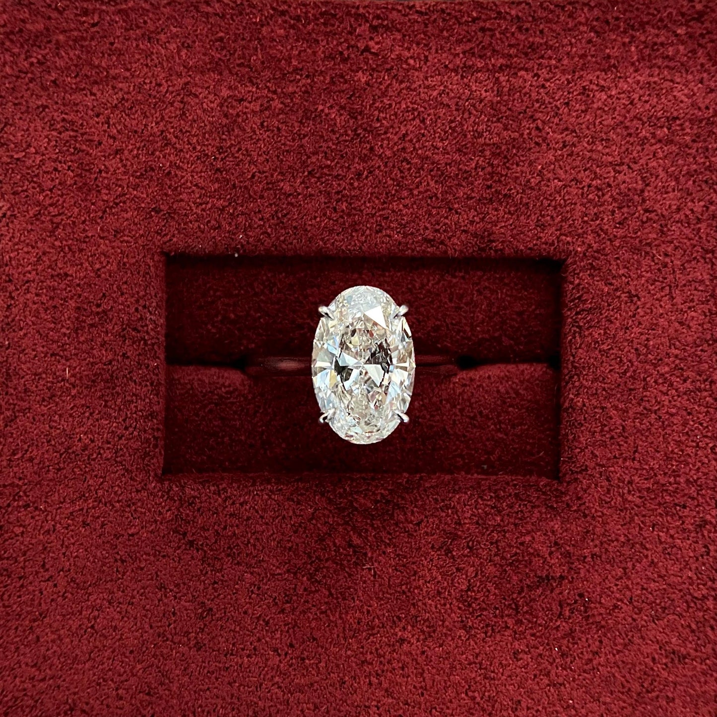 Oval cut CVD diamond solitaire style engagement ring