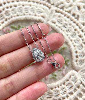 Halo Necklace with 1.0 TCW Pear Cut Moissanite