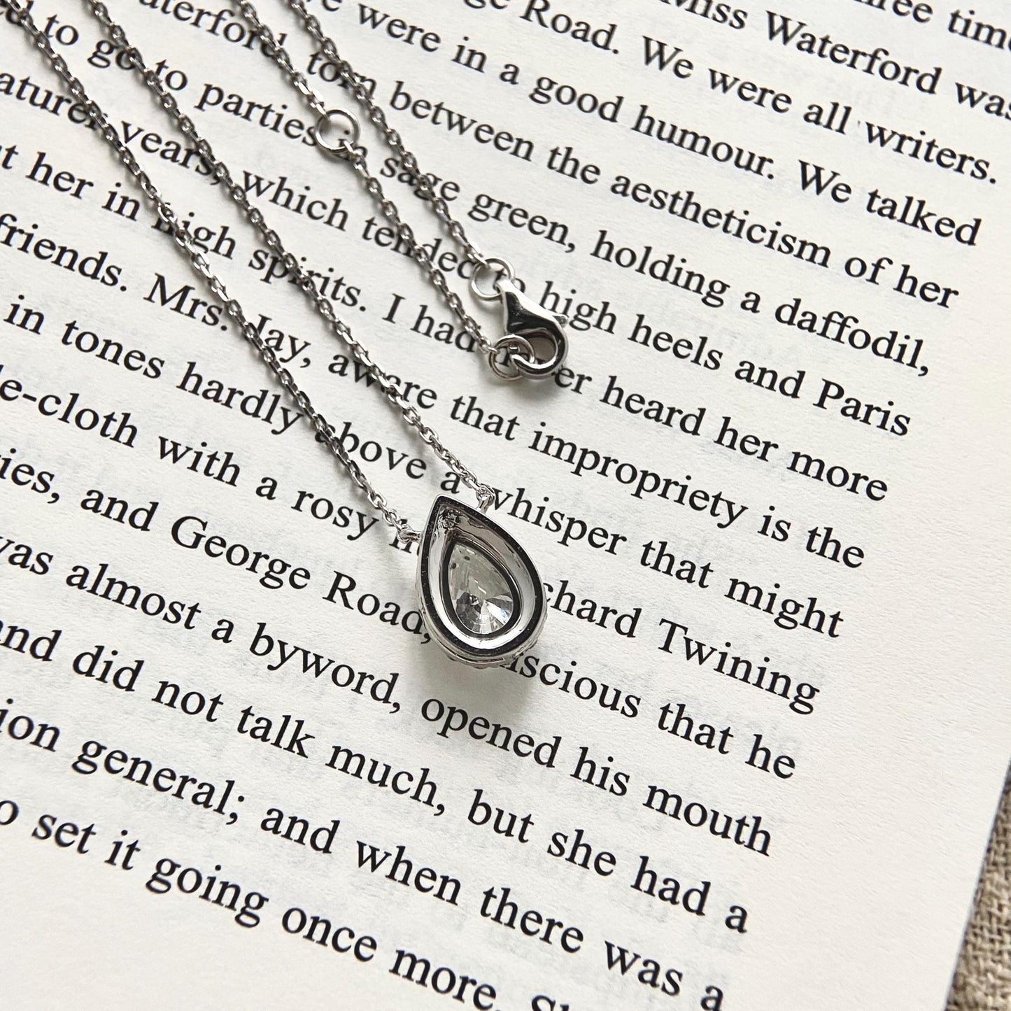 Halo Necklace with 1.0 TCW Pear Cut Moissanite