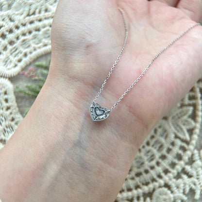 Halo Necklace with 0.5 TCW Heart Cut Moissanite