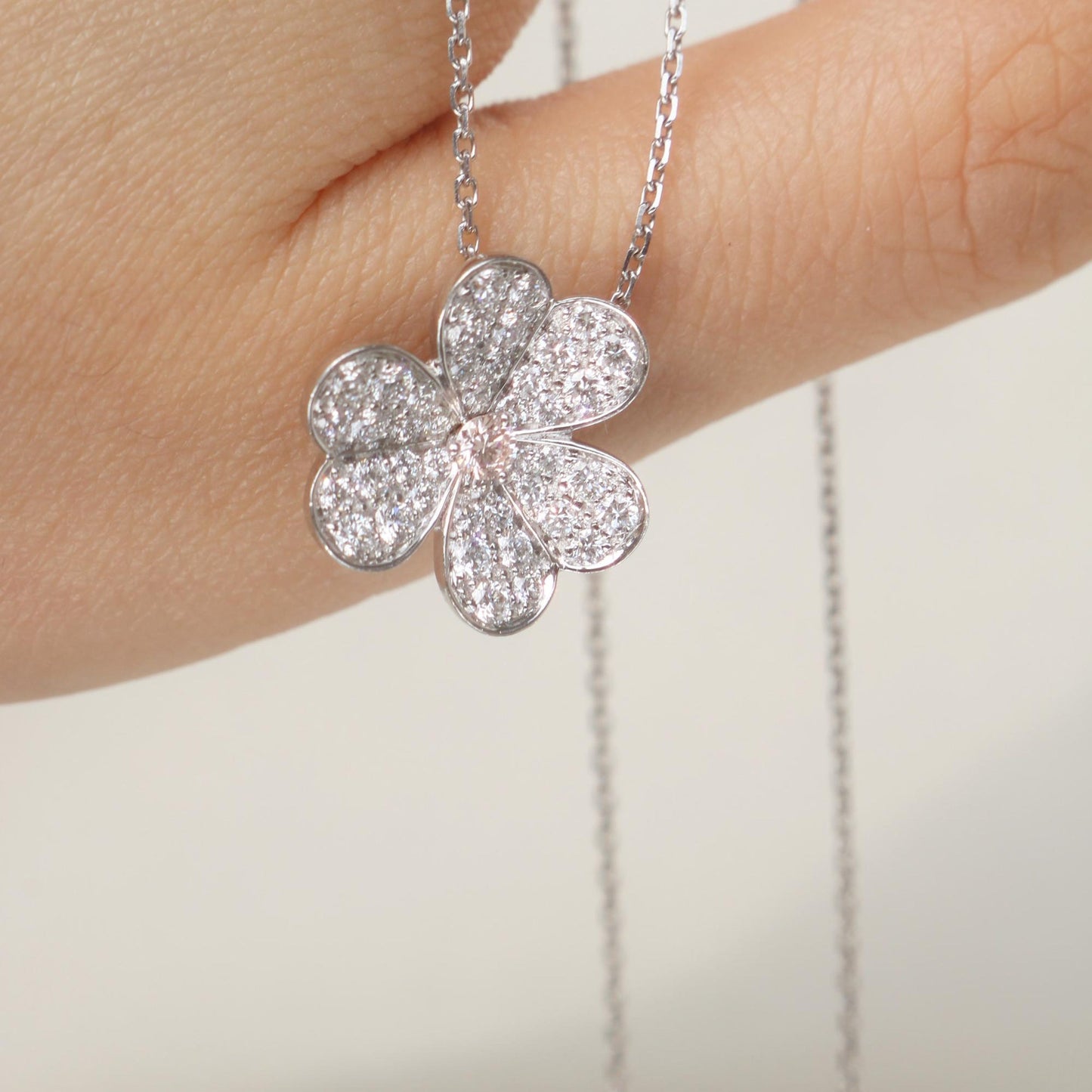 Flower Necklace with 0.07 TCW Round Cut Moissanite