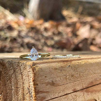 Hidden Halo Bridal Ring Set with 0.75 CT Pear Cut Moissanite