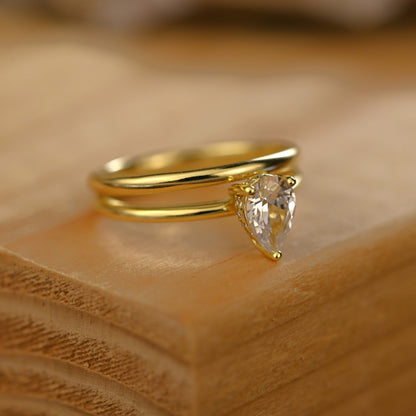 Hidden Halo Bridal Ring Set with 0.75 CT Pear Cut Moissanite
