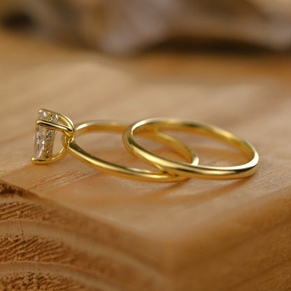 Hidden Halo Bridal Ring Set with 0.75 CT Pear Cut Moissanite