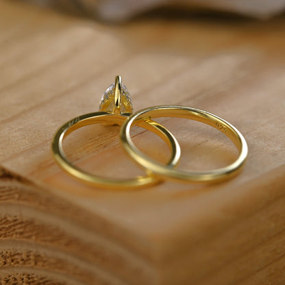 Hidden Halo Bridal Ring Set with 0.75 CT Pear Cut Moissanite