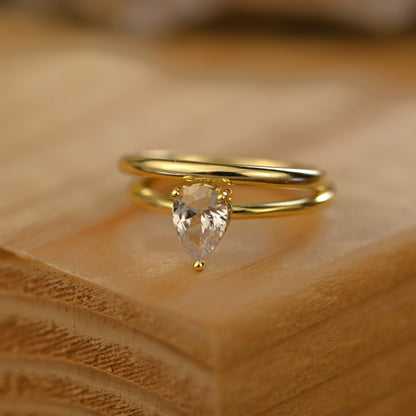 Hidden Halo Bridal Ring Set with 0.75 CT Pear Cut Moissanite