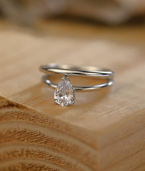 Hidden Halo Bridal Ring Set with 0.75 CT Pear Cut Moissanite