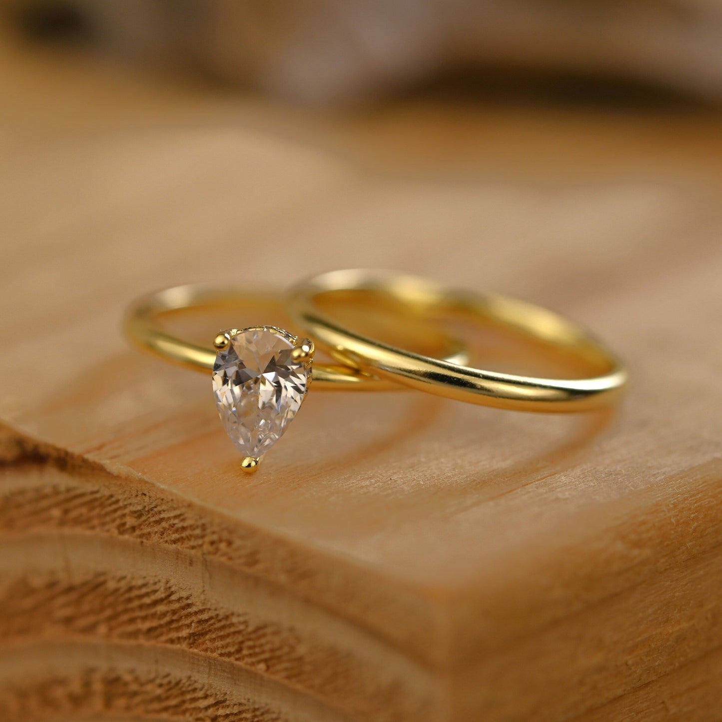Hidden Halo Bridal Ring Set with 0.75 CT Pear Cut Moissanite