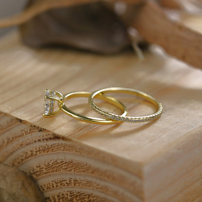 Hidden Halo Bridal Ring Set with 0.75 CT Pear Cut Moissanite