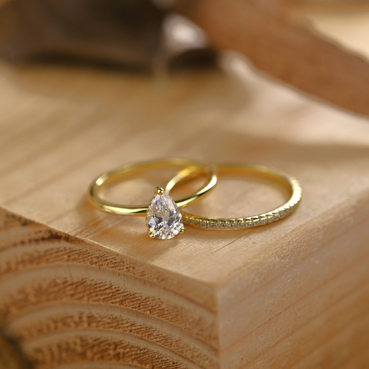 Hidden Halo Bridal Ring Set with 0.75 CT Pear Cut Moissanite