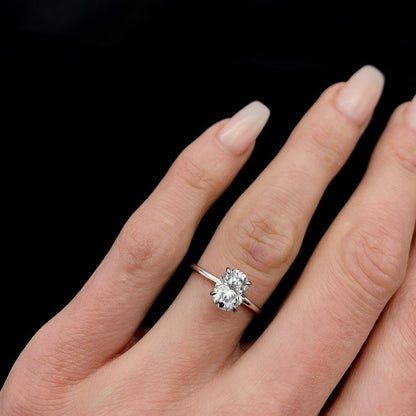 Elegant solitaire engagement ring with oval cut moissanite stone