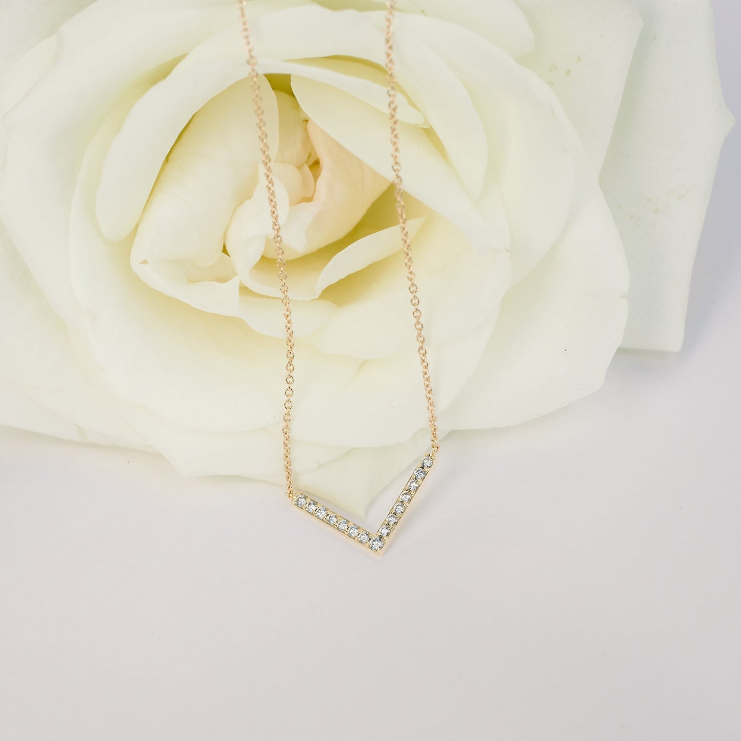 V Style Necklace with 0.24 TCW Round Cut Moissanite