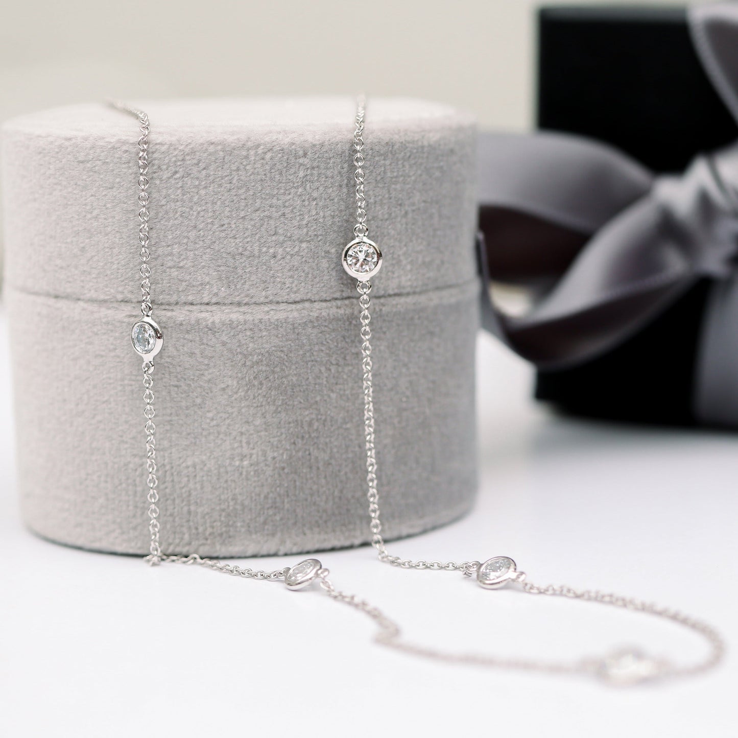 Five Bezel Necklace with 0.25 TCW Floating Cosmopolitan Round Cut Moissanite
