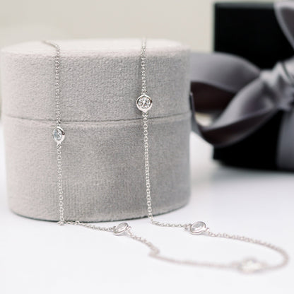Five Bezel Necklace with 0.25 TCW Floating Cosmopolitan Round Cut Moissanite