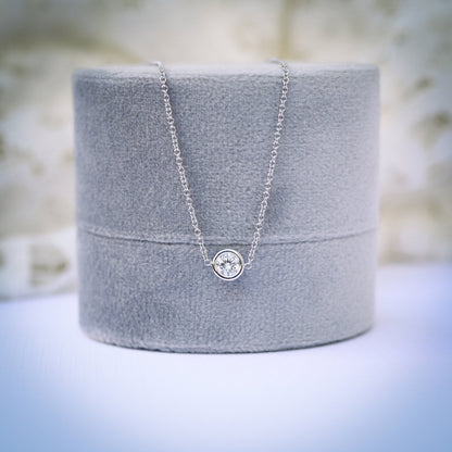 Single Bezel Necklace with 0.10 TCW Floating Cosmopolitan Round Cut Moissanite