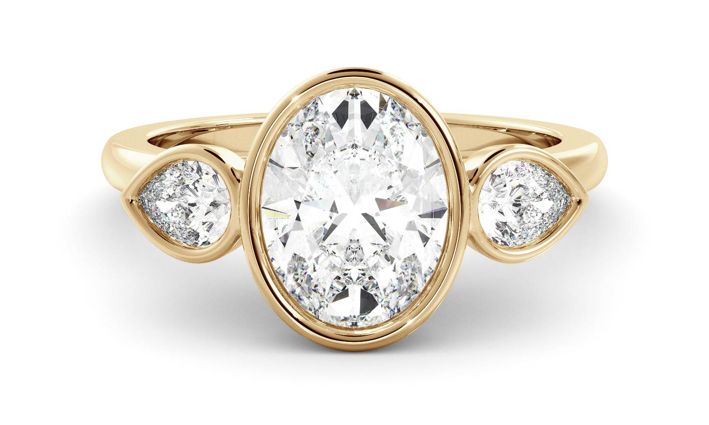 Three Stone & Bezel Ring with 1.20 CT Oval Moissanite