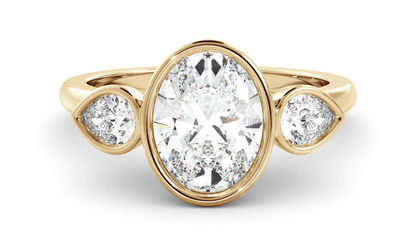 Three Stone & Bezel Ring with 1.20 CT Oval Moissanite