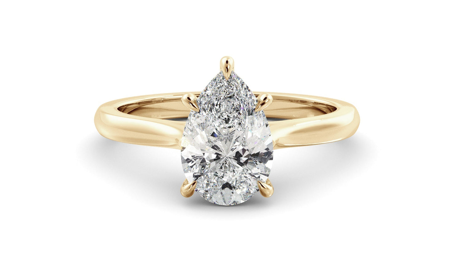 Solitaire Ring with 1.30 CT Pear Moissanite