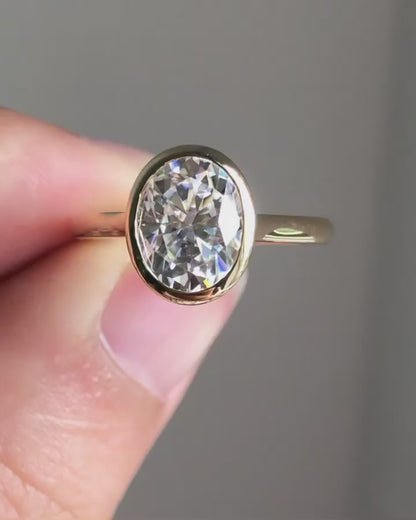 Bezel Hidden Halo Ring with 1.33 CT Oval Cut Moissanite