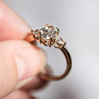 Three Stone Ring with 1.50 CT Oval Moissanite