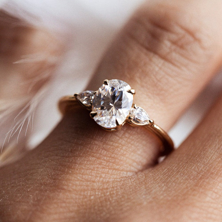Three Stone Ring with 1.50 CT Oval Moissanite
