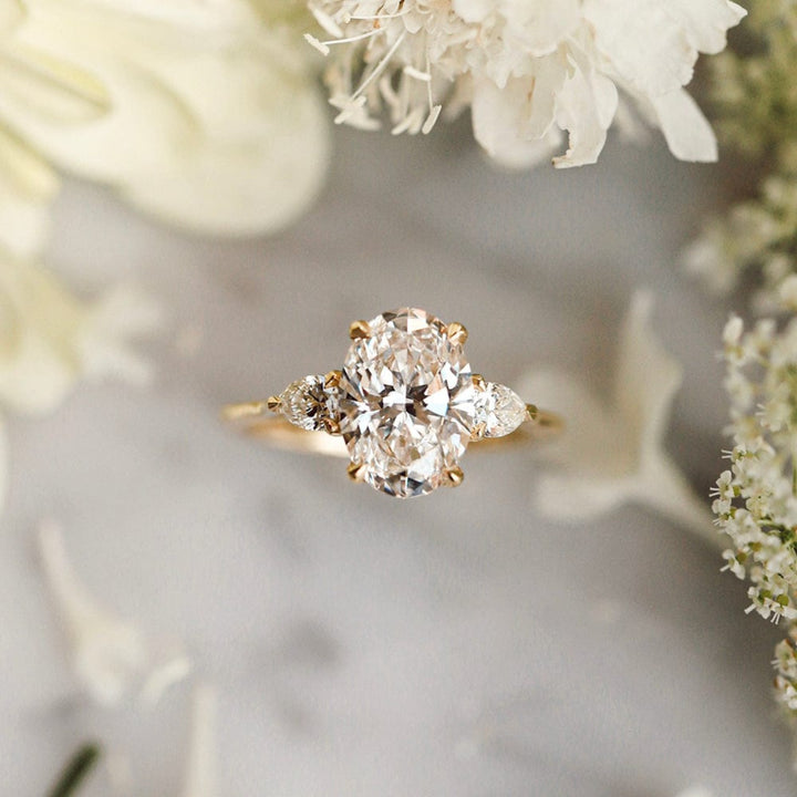 Three Stone Ring with 1.50 CT Oval Moissanite