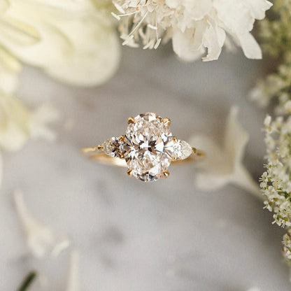 Three Stone Ring with 1.50 CT Oval Moissanite