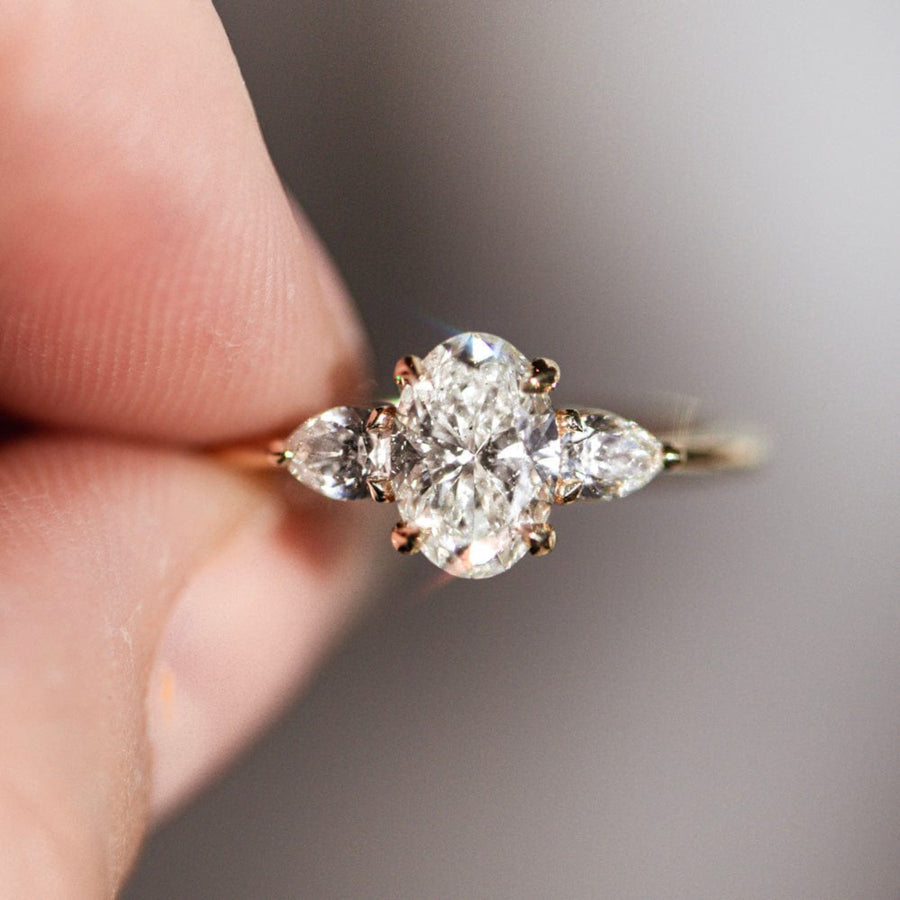 Three Stone Ring with 1.50 CT Oval Moissanite