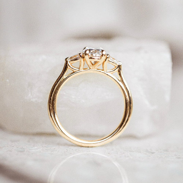 Three Stone Ring with 1.50 Ct Oval Moissanite