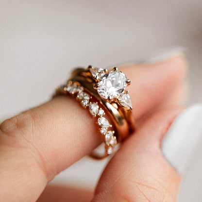 Three Stone Ring with 1.50 Ct Oval Moissanite