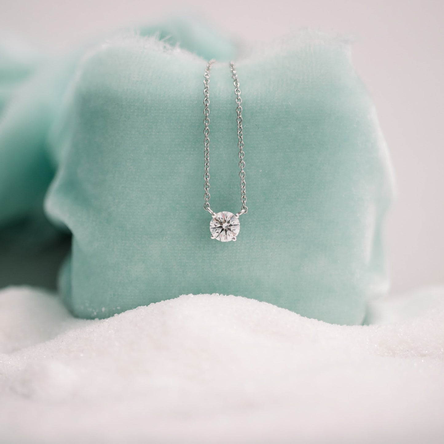 Solitaire Necklace with 1.0 CT Floating Round Cut Moissanite