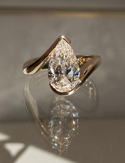 1.0 - 2.5 CT Pear Shaped Lab Grown Diamond Bypass Style Engagement Ring