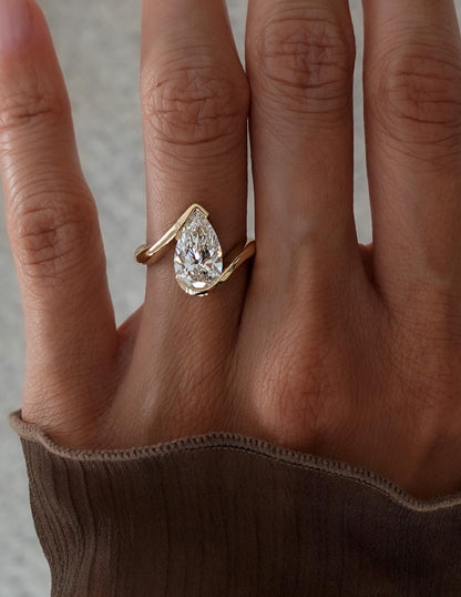 1.0 - 2.5 CT Pear Shaped Lab Grown Diamond Bypass Style Engagement Ring