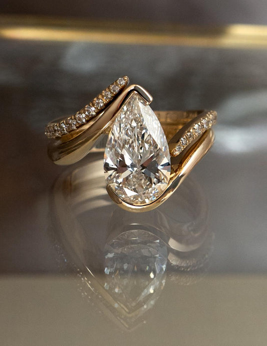 1.0 - 2.5 CT Pear Shaped Lab Grown Diamond Solitaire Bridal Set
